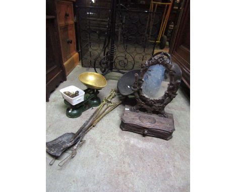 A 19th century Austrian carved pinewood dressing table mirror, the oval mirror plate supported within a carved rustic framewo