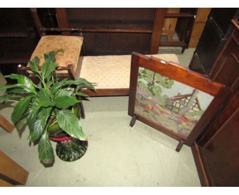 An Edwardian ceramic jardiniere and stand containing a healthy aspidistra, a low stool with upholstered top on turned support