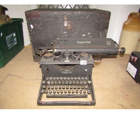 A 19th century pine travelling box with original painted finish together with a vintage Imperial manual typewriter with long 