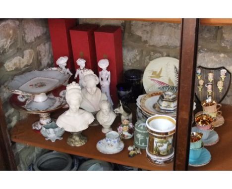 A 19th century continental burner, cover and stand with painted landscape decoration, a harlequin set of six coffee cups and 
