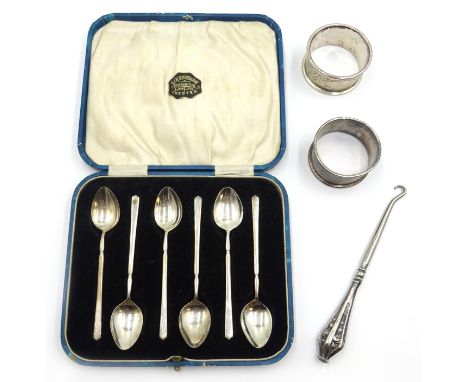 Set of six silver coffee spoons, cased two napkin rings approx 3oz and button hook with silver handle