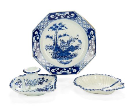  A Bow blue and white octagonal chinoiserie plate  , circa 1765, painted with oriental plants, 19cm diameter;  and a Bow blue