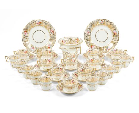  A Davenport porcelain part tea service  ,  circa 1825, decorated with panels of flowers within a gilt coral and diaper band 