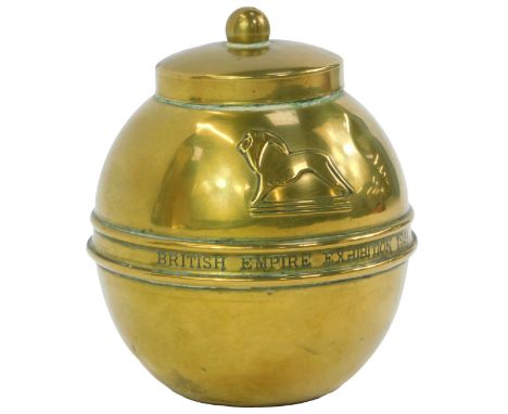 A Lipton's brass souvenir tea caddy, of orb form, produced to Commemorate The British Empire Exhibition 1924, 14cm high. 
