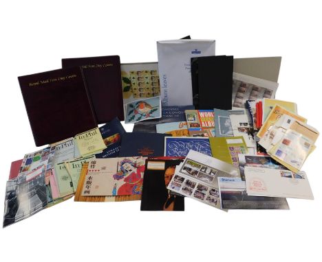 Stamps and Ephemera. Two new Royal Mail First Day Cover albums (empty), several S.G. reference works, mounting strips and a s