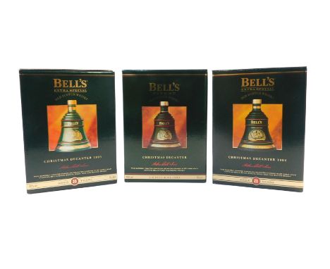 Three Bell's Scotch whisky Christmas decanters, for 1993, 1994, and 1995, all 70cl.