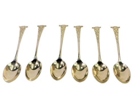 A set of six George V silver coffee spoons, each with a floral and scroll decorated handle, Wakely and Wheeler, London 1934, 