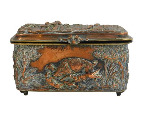 A 19thC Continental copper casket, formerly silver plated, depicting differing stages in the hunting of a boar, the hinged li