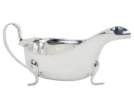 A George VI silver sauceboat, with a gadrooned border, raised on pad feet, Viners Ltd, Sheffield 1946, 5.02oz.