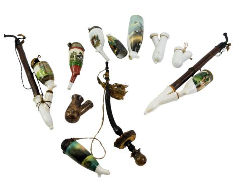 A group of German ceramic pipes, mainly transfer printed, to include examples decorated with deer, horses, etc. (a quantity)