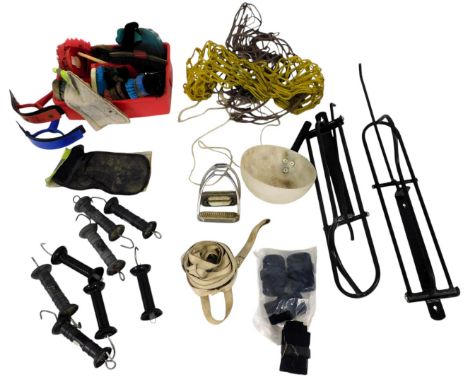 A quantity of equestrian related items, to include brushes, hoof picks, lunge rope, feed measure, haynets, caddy, fencing hoo