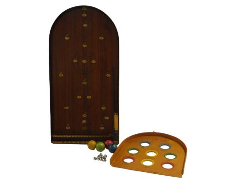 A mahogany bagatelle board, 75.5cm high, together with a Chad Valley skee board game. 