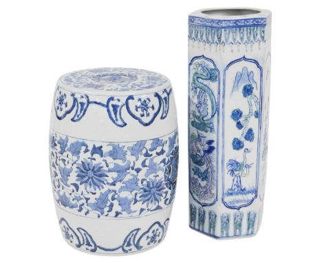 A Chinese blue and white porcelain barrel shaped stool, decorated with flowers and pierced decoration, 45cm high, together wi