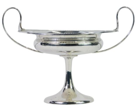 An Edward VII silver twin handled tazza, the circular top with pierced roundel and rectangular decoration, on a circular stem