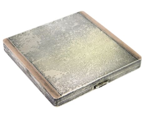 An Elizabeth II silver powder compact, of square form, with engine turned decoration and plated gold decoration, Birmingham 1