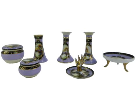 A Noritake porcelain part dressing table set, each piece decorated with a reserve depicting a lake and buildings against a li