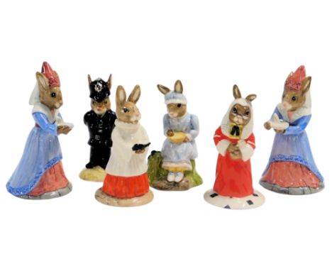 Six Royal Doulton Bunnykins figures, modelled as Sundial (2), Little Miss Muffet, Choir Members, Policeman Bunnykin, and Judg