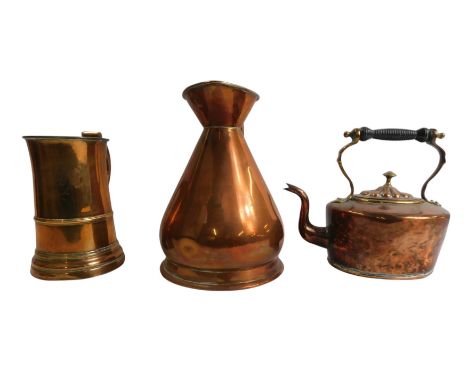 A group of copper ware, comprising a half gallon flagon, 24cm high, a copper kettle, with ebonised handle, 21cm high, and a t