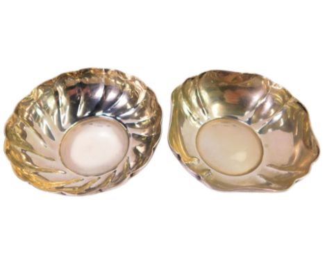 Two German silver dishes, one of part fluted form, the other of shaped stylised flower head form, each stamped Lavorto 800, 1