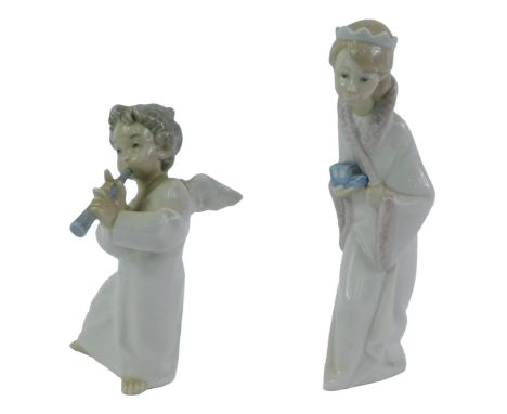 Two Lladro porcelain figures, modelled as a girl wearing a nightgown carrying a toy car, printed marks, 21cm high, together w