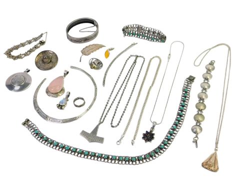 A selection of silver jewellery, including pendants, necklaces and brooches, and a Jorgen Jensen pewter pendant on chain. (a 
