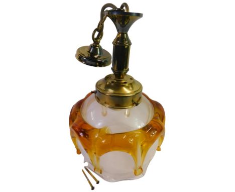 A late 20thC Murano amber and clear glass ceiling light, with a brass fitting, 31cm high. 