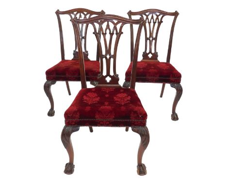 Three late 19thC mahogany dining chairs, with Gothic splat backs in the Chippendale manner, crushed velvet seats, cabriole le