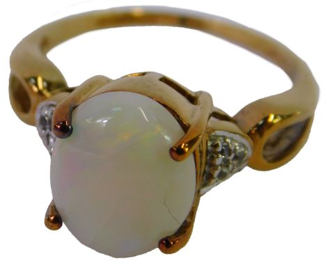A 9ct gold and opal ring, high claw set with diamond set shoulders, size P, with certificate, 3.7g. 