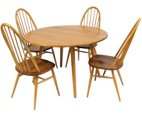 An Ercol light elm drop leaf dining table, the circular top with a rounded edge, on square tapering legs, 71cm high, the top 