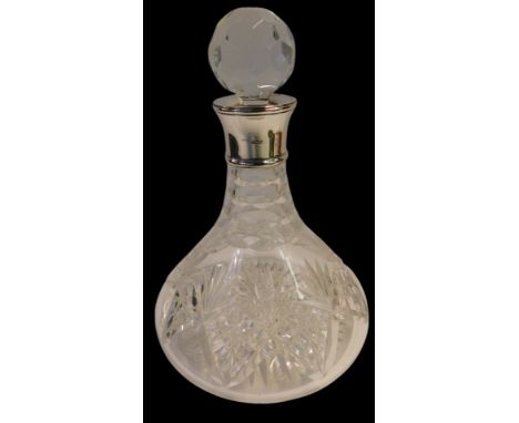 An Elizabeth II silver collared cut glass decanter and stopper, Birmingham 1995, 27.5cm high.