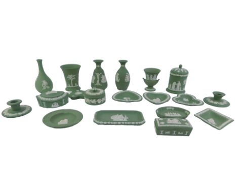 A group of Wedgwood green jasperware, to include a jar and cover, 13cm high, various trinket boxes, trinket dishes, chamberst