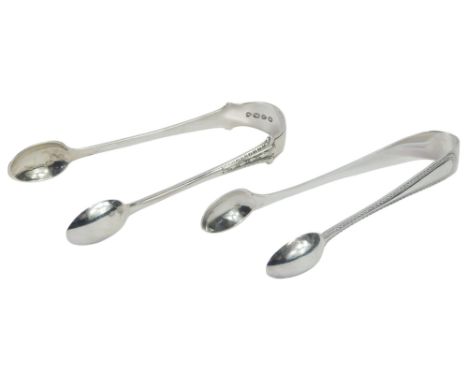 A pair of George V silver sugar tongs, John Round and Son Ltd, Sheffield 1919, and a pair of Victorian silver sugar nips, Lon