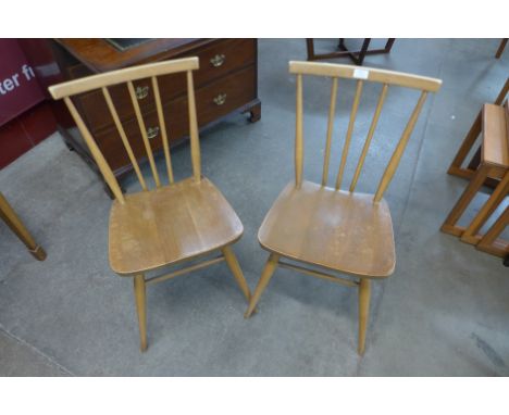 A pair of Ercol Blonde chairs 