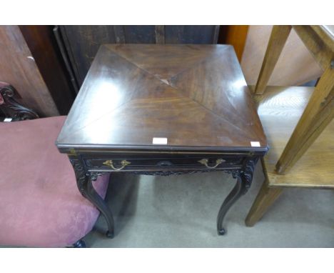 An Edward VII mahogany envelope fold-over card table 