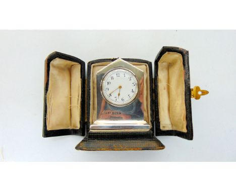 A cased Edwardian silver clock, William Henry Sparrow, Birmingham, 1905, the plain architectural casing with white enamelled 
