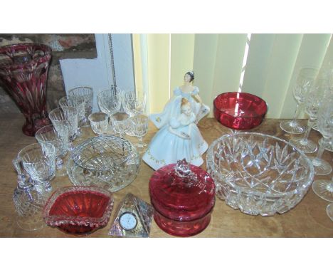 Five Edinburgh crystal wine glasses, together with an Edinburgh small crystal desk clock of pyramid form with a quartz moveme