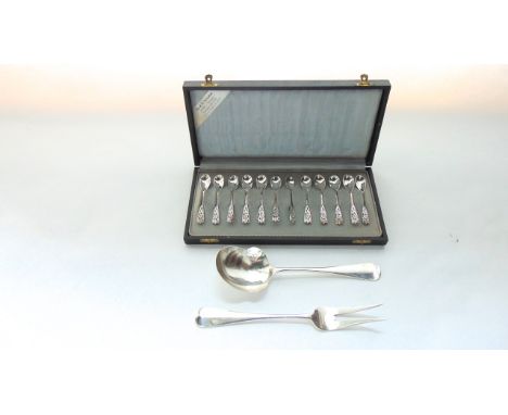 A cased set of twelve Dutch silver demitasse spoons, 1906 - 1953, each handle with floral decoration, 74.7g in total; a Dutch