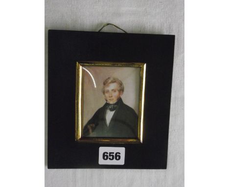 A 19th century bust length miniature portrait of rectangular form showing a young gentleman in black coat and necktie, 8 x 7c