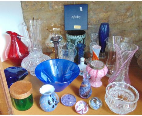 A selection of glassware to include a ruby glass jug with applied clear glass handle, various other vases including an exampl