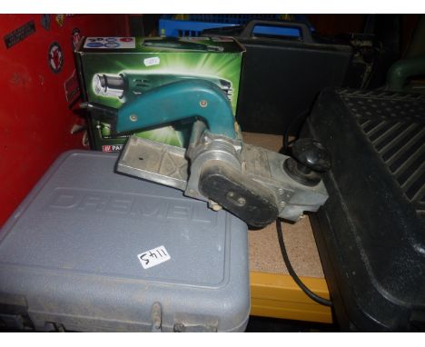 A cased Dremel sander F013-6000R, a Parkside heat gun PHLG 2000 B1, a Black and Decker electric circular saw, a further Black