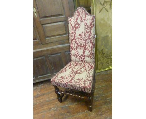 A carolean style single chair raised on bobbin moulded supports and rails with recently re-upholstered seat and back