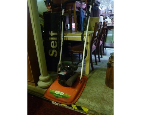 An Allen 216 air cushioned petrol rotary lawn mower with Tecumseh MV 100S engine