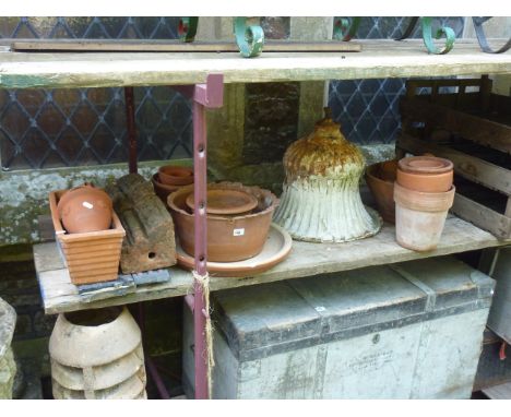 A 19th century cast iron fluted garden urn of circular waisted form raised on a squat square cut pedestal (AF) together with 