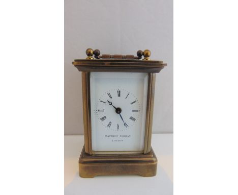 A small Matthew North carriage clock in brass with eight day movement, 9cm high