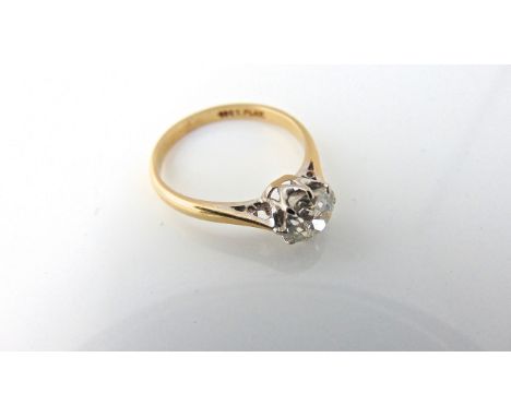 A single-stone diamond ring, claw-set with an old brilliant-cut diamond weighing approximately 1.29cts, in 18ct gold and plat