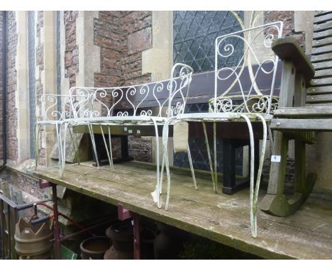 A 4-piece decorative painted steel matched suite of garden furniture comprising a low 2-seat bench with matching armchair, a 