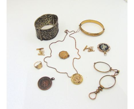 A coin inset ring, mounted in 9ct gold; a gold-plated hinged bangle; a coin pendant, on a gold-plated box-link chain; a gold-