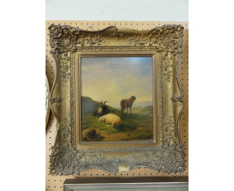 An early 19th century oil painting on panel attributed to Eugene-Joseph Verboekhoven and showing a landscape with goat and tw