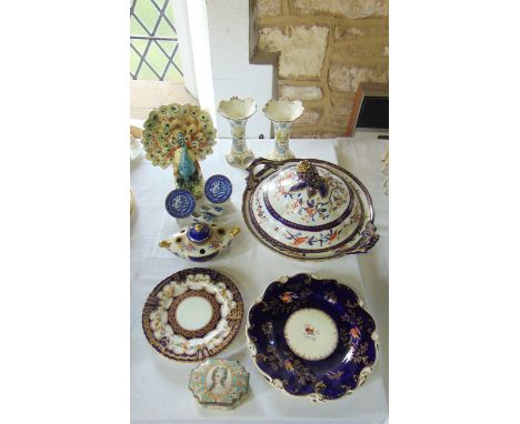 A 19th century majolica spill/flower holder in the form of a peacock together with further 19th century ceramics including a 