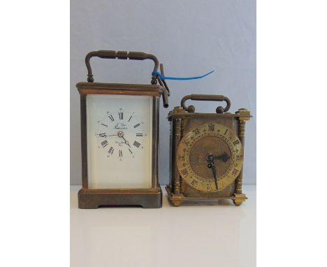 A French brass carriage clock with eight day striking action, the case with picture panel sides and the dial marked L'Epee, t